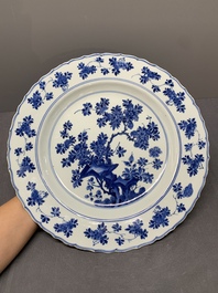 A Chinese blue and white dish with floral design, Kangxi mark and of the period