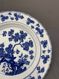 A Chinese blue and white dish with floral design, Kangxi mark and of the period