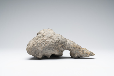 A Chinese Lingbi stone scholar's rock on wooden stand, 20th C.