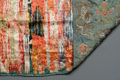 A Chinese green-ground embroidered silk panel with dragons among clouds, 18th C.