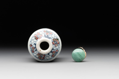 A Chinese blue, white and copper-red 'Journey to the West' snuff bottle, Yongzheng mark, 19th C.