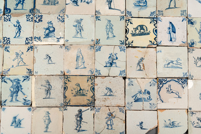 105 polychrome, blue and white Dutch Delft tiles with figures, flowers and animals, 17/18th C.