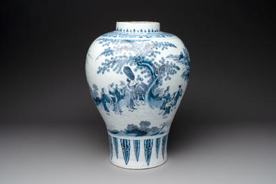A very large Dutch Delft blue and white chinoiserie baluster vase, last quarter 17th C.