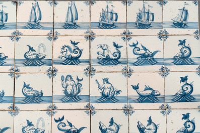 A field of 30 Dutch Delft blue and white tiles with sea creatures and ships, 18th C.