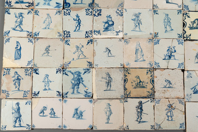 105 polychrome, blue and white Dutch Delft tiles with figures, flowers and animals, 17/18th C.