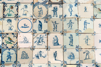 105 polychrome, blue and white Dutch Delft tiles with figures, flowers and animals, 17/18th C.