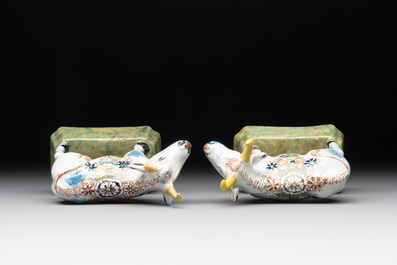 A pair of polychrome Dutch Delft cows, 18th C.
