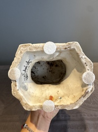 A Chinese Dehua blanc de Chine seated Guanyin, Qianlong mark, Republic