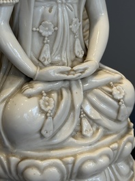 A Chinese Dehua blanc de Chine seated Guanyin, Qianlong mark, Republic