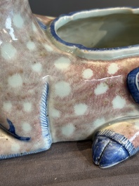 A pair of Chinese blue, white and copper-red stag-shaped jardini&egrave;res, 19th C.