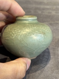 Six Chinese Longquan celadon jarlets with incised floral design, Yuan/Ming