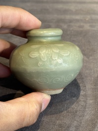 Six Chinese Longquan celadon jarlets with incised floral design, Yuan/Ming