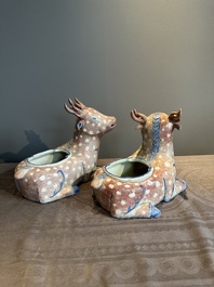 A pair of Chinese blue, white and copper-red stag-shaped jardini&egrave;res, 19th C.