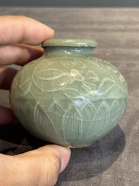 Six Chinese Longquan celadon jarlets with incised floral design, Yuan/Ming