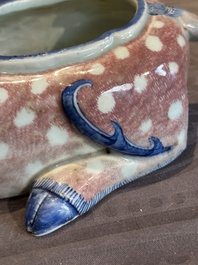 A pair of Chinese blue, white and copper-red stag-shaped jardini&egrave;res, 19th C.