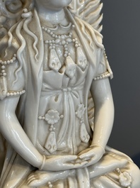 A Chinese Dehua blanc de Chine seated Guanyin, Qianlong mark, Republic