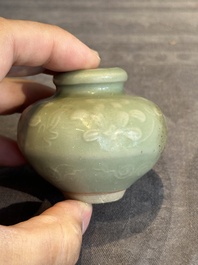 Six Chinese Longquan celadon jarlets with incised floral design, Yuan/Ming