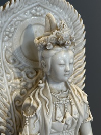 A Chinese Dehua blanc de Chine seated Guanyin, Qianlong mark, Republic