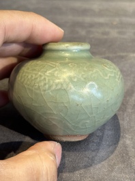 Six Chinese Longquan celadon jarlets with incised floral design, Yuan/Ming