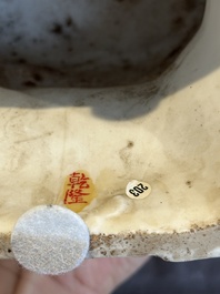 A Chinese Dehua blanc de Chine seated Guanyin, Qianlong mark, Republic