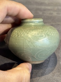 Six Chinese Longquan celadon jarlets with incised floral design, Yuan/Ming