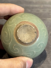 Six Chinese Longquan celadon jarlets with incised floral design, Yuan/Ming