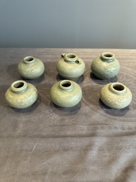 Six Chinese Longquan celadon jarlets with incised floral design, Yuan/Ming