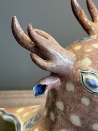A pair of Chinese blue, white and copper-red stag-shaped jardini&egrave;res, 19th C.