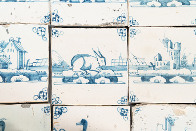 53 blue and white Dutch Delft tiles with animals and landscapes, 18th C.