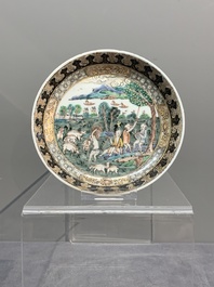 A fine Chinese famille rose 'apple pickers' cup and saucer, Yongzheng