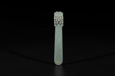 A Chinese pale celadon jade 'double happiness' hairpin on a ruyi-shaped wooden stand, 19th C.