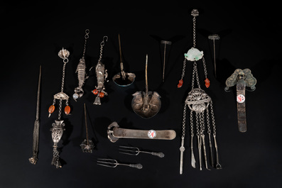 A collection of Chinese silver jewellery, some pieces adorned with enamel and precious stones, 19/20th C.