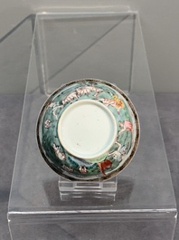 A fine Chinese famille rose 'apple pickers' cup and saucer, Yongzheng