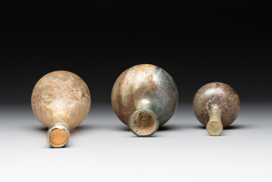 A group of six Roman glass flasks, 1st/4th C.