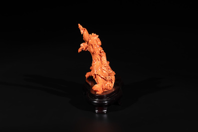 A Chinese red coral 'Sanxing' group on wooden stand, 19/20th C.