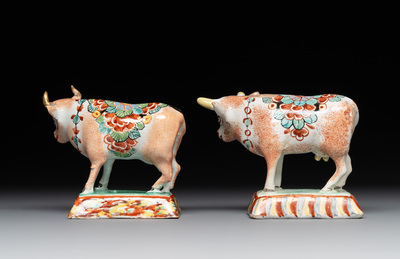 Four polychrome and petit feu Dutch Delft cows, 18th C.