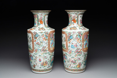A pair of Chinese Canton famille rose vases and two plates, 19th C.