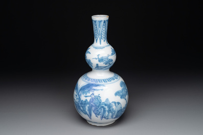 A blue and white Dutch Delft double gourd chinoiserie vase, 17th C.