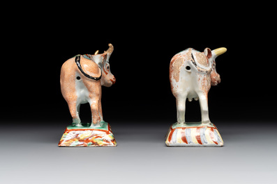 Four polychrome and petit feu Dutch Delft cows, 18th C.