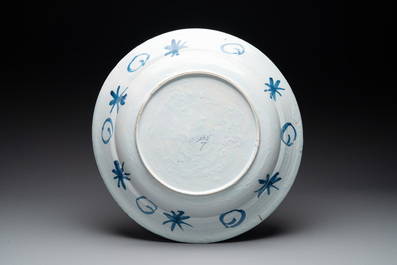 A large blue and white Dutch Delft chinoiserie dish, late 17th C.