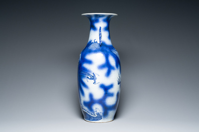 A Chinese blue and white 'dragon and carp' vase, 19th C.