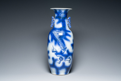 A Chinese blue and white 'dragon and carp' vase, 19th C.