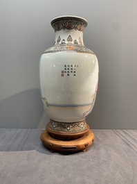 A Chinese famille rose vase with ladies on wooden stand, Qianlong mark, Republic