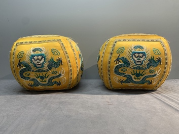 A pair of Chinese yellow-ground embroidered silk 'dragon' cushions, 19th C.