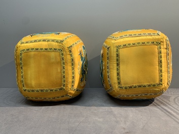 A pair of Chinese yellow-ground embroidered silk 'dragon' cushions, 19th C.