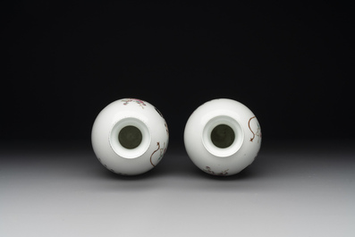 A pair of Chinese famille rose semi-eggshell 'ladies and boys' vases, Hongxian mark, 20th C.