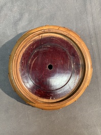 A Chinese famille rose vase with ladies on wooden stand, Qianlong mark, Republic