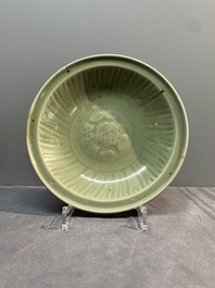 A Chinese Longquan celadon dish and a plate with floral design, Ming