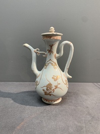 A Chinese iron-red and gilt-decorated ewer with floral design, Kangxi
