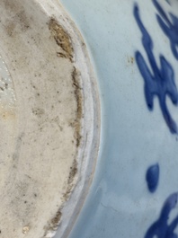 A Chinese blue and white 'lotus scroll' vase with wooden cover, Kangxi